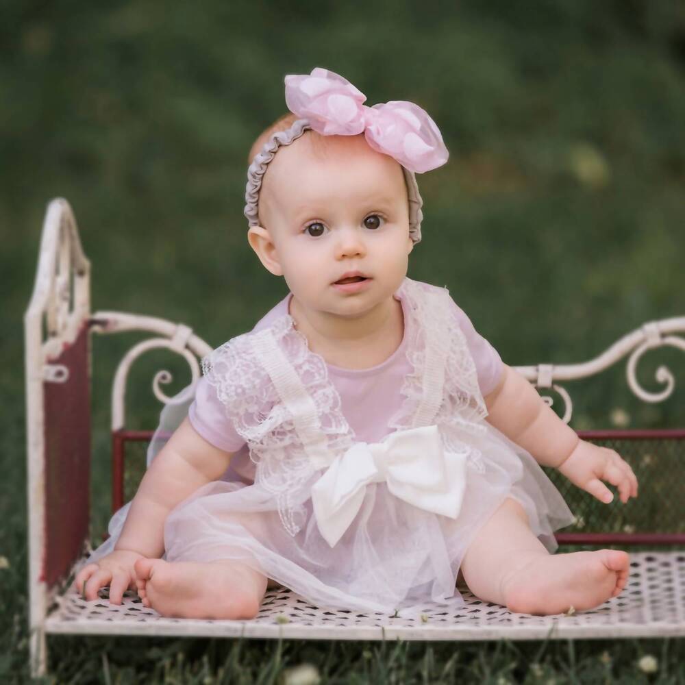 NEW MAE LI ROSE lace and bow onesie in lavender